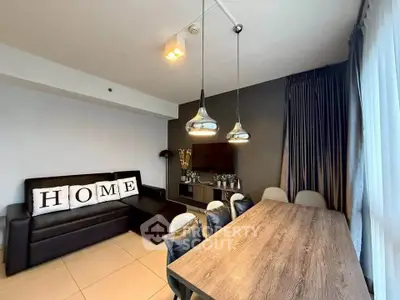 Modern living room with stylish decor and dining area