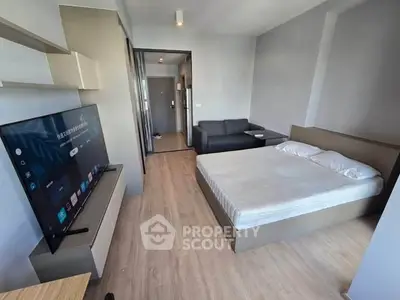 Modern studio apartment with sleek design and cozy furnishings