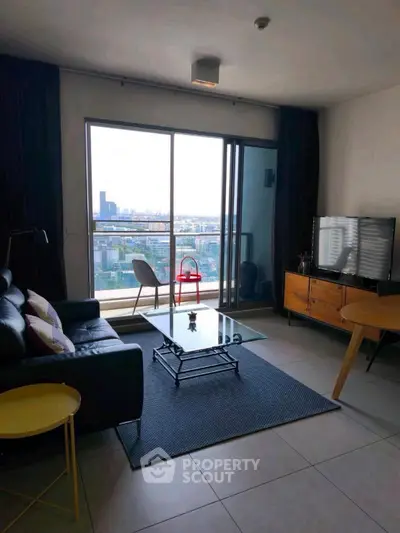 Modern living room with city view and stylish furniture