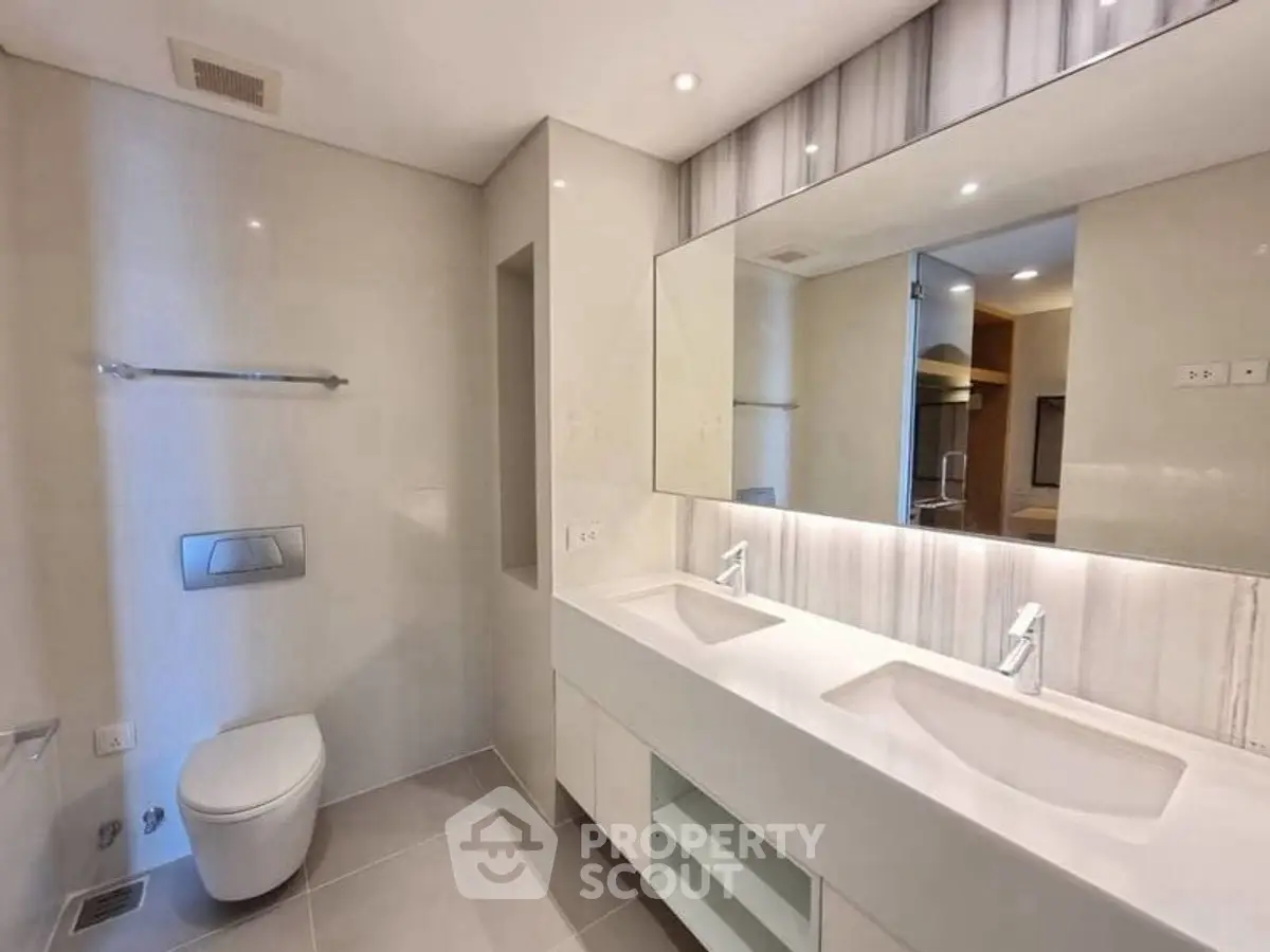 Modern bathroom with dual sinks and sleek design