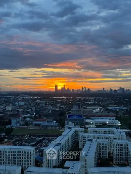Stunning cityscape view at sunset with modern buildings and vibrant skyline.