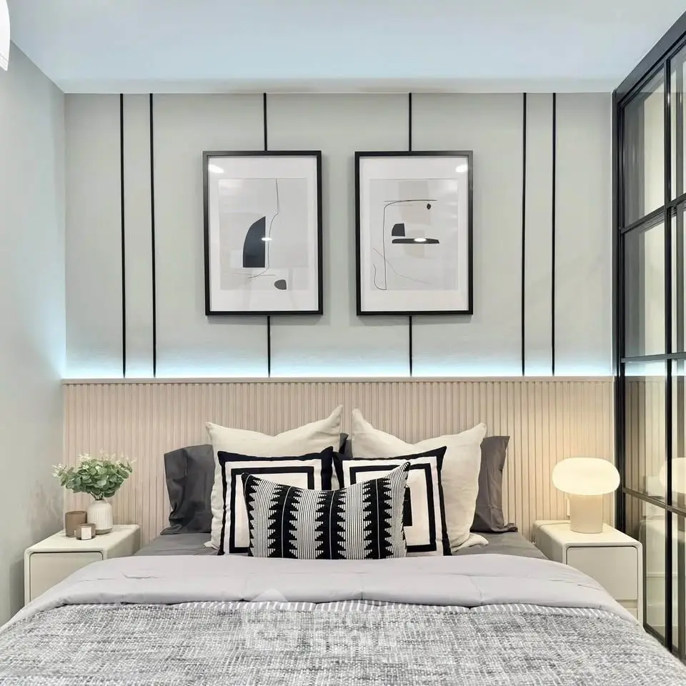 Stylish modern bedroom with elegant decor and cozy ambiance.
