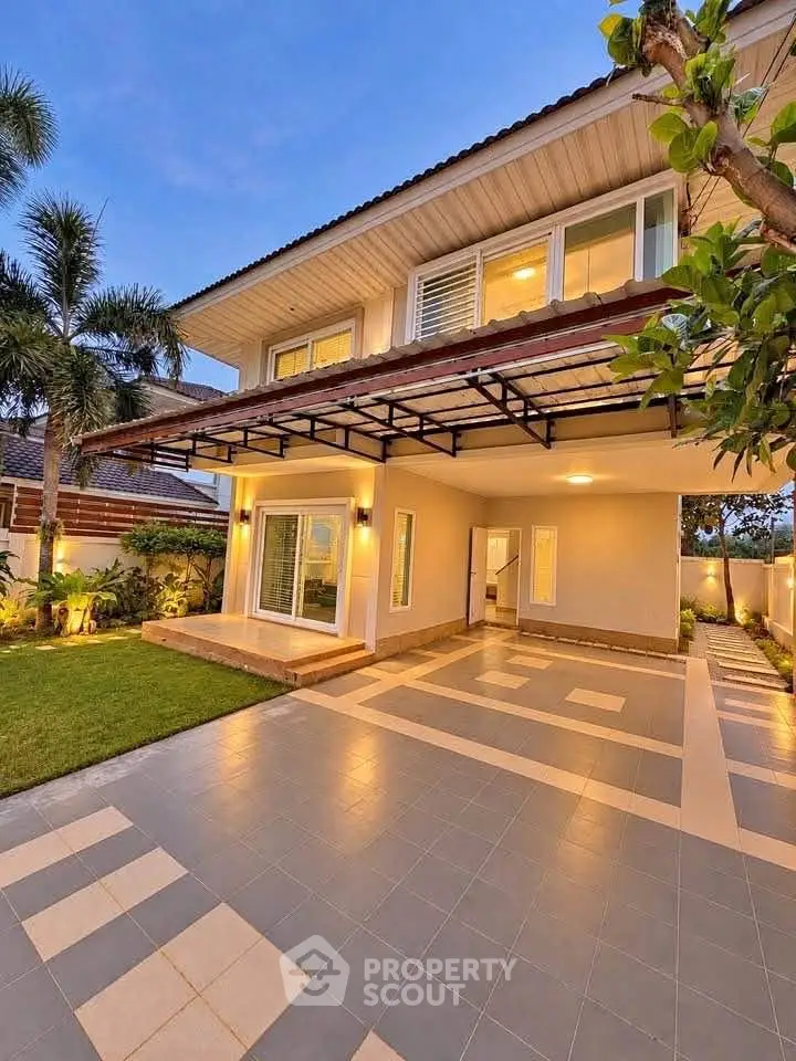 Stunning modern two-story house with spacious driveway and lush garden
