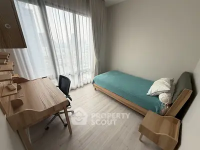 Modern minimalist bedroom with city view, featuring sleek wooden furniture and large windows.