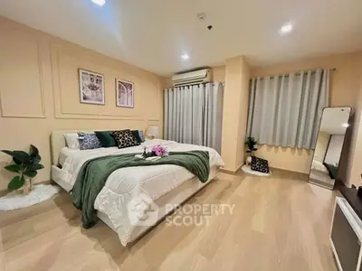 Luxurious bedroom with elegant decor and cozy ambiance, featuring a plush bed and stylish furnishings.