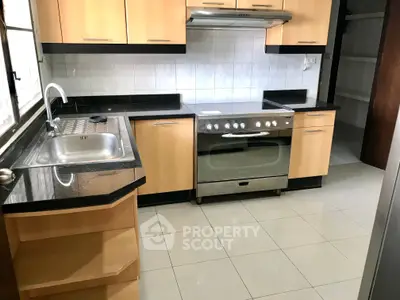 Modern kitchen with sleek cabinetry and stainless steel appliances, perfect for culinary enthusiasts.