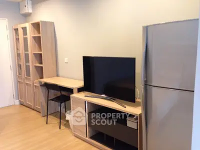 Modern living room with sleek TV setup and spacious storage
