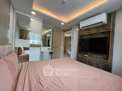 Modern bedroom with stylish decor and built-in air conditioning unit