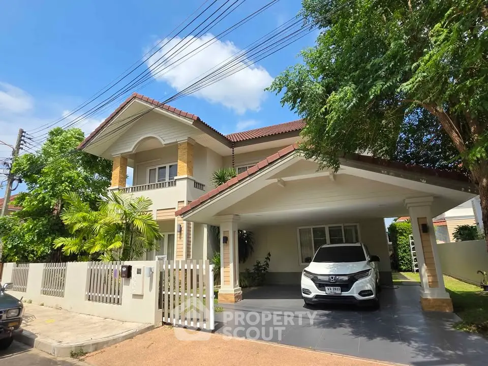 Charming suburban house with carport and lush greenery, perfect for family living.