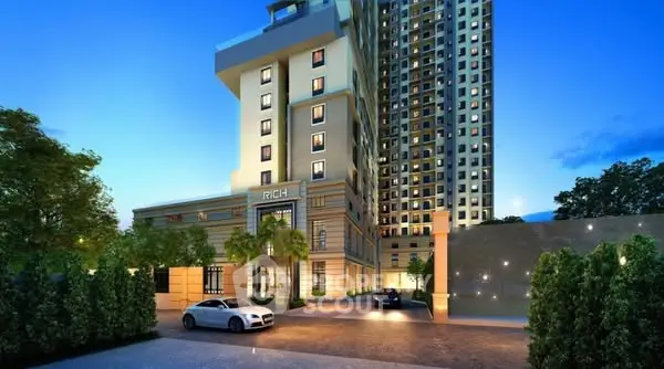 Luxurious high-rise building exterior with elegant entrance and modern design.