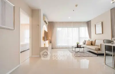 Spacious modern living room with elegant decor and natural light