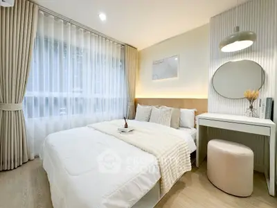 Elegant bedroom with modern decor, featuring a cozy bed, stylish vanity, and soft lighting for a serene ambiance.