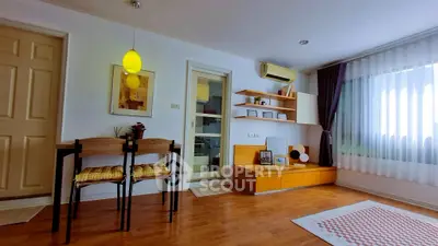 Charming living room with modern decor and natural light