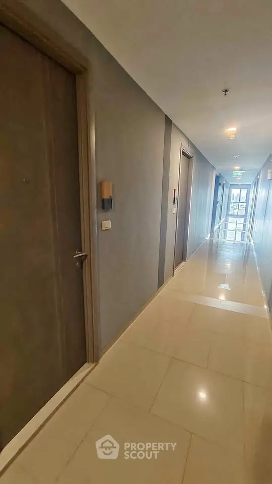 Modern apartment corridor with sleek design and polished floors