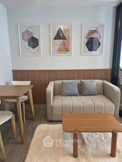 Modern living room with stylish decor and cozy furniture, perfect for relaxation and entertaining.
