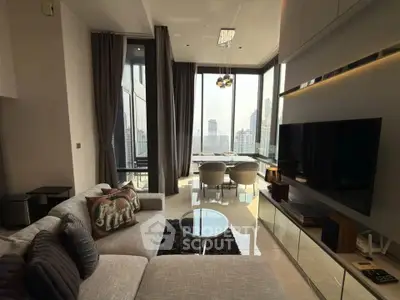 Luxurious living room with panoramic city views and modern furnishings