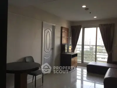 Modern living room with balcony view in urban apartment