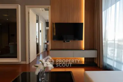 Modern living room with sleek TV setup and elegant decor