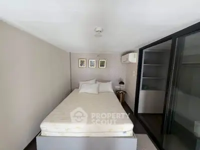 Cozy bedroom with modern decor and ample storage space