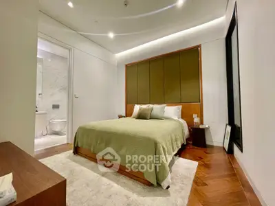 Luxurious modern bedroom with ensuite bathroom and elegant decor