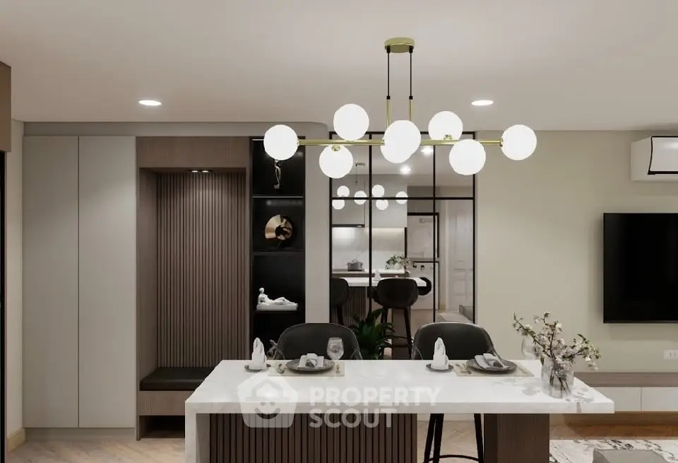 Modern dining area with elegant lighting and stylish decor in a contemporary home.