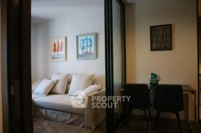 Cozy living room with stylish decor and comfortable seating in modern apartment.