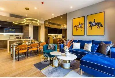 Luxurious open-plan living room with modern kitchen and stylish decor