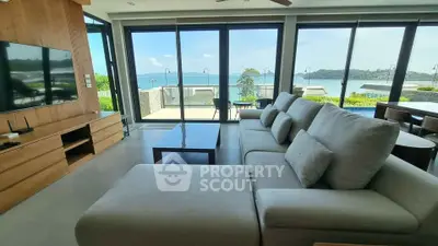 Luxurious living room with stunning ocean view and modern furnishings