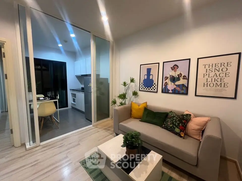 Modern living room with stylish decor and open kitchen layout