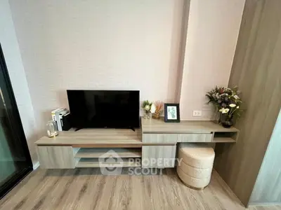 Modern living room with sleek TV stand and stylish decor