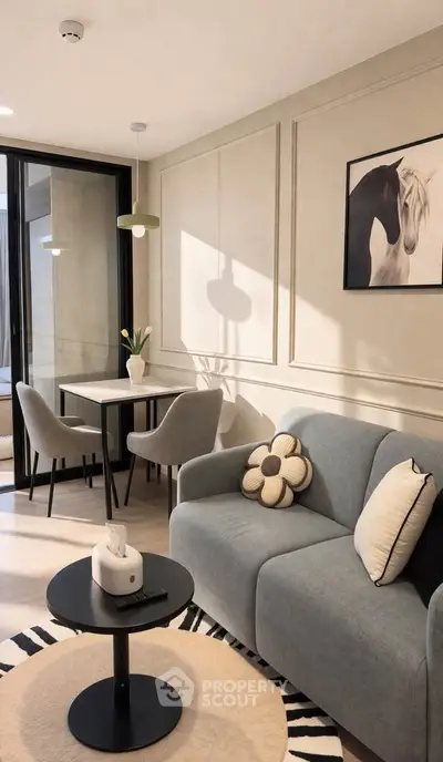 Stylish modern living room with elegant decor and cozy seating area.