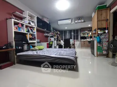 Spacious studio apartment with modern furnishings and ample storage space