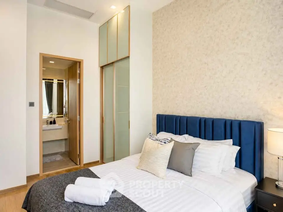 Luxurious bedroom with ensuite bathroom and elegant decor