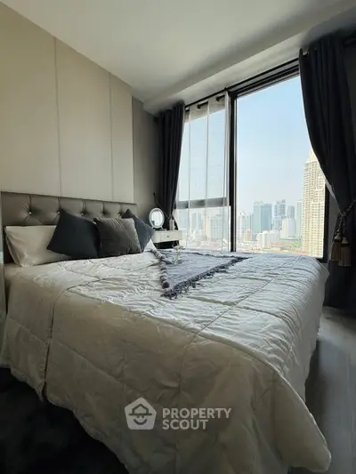Luxurious bedroom with stunning city view and elegant decor
