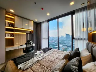 Luxurious bedroom with stunning city view and modern decor