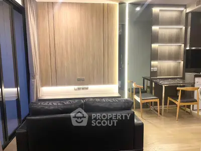 Modern living room with sleek furniture and ambient lighting