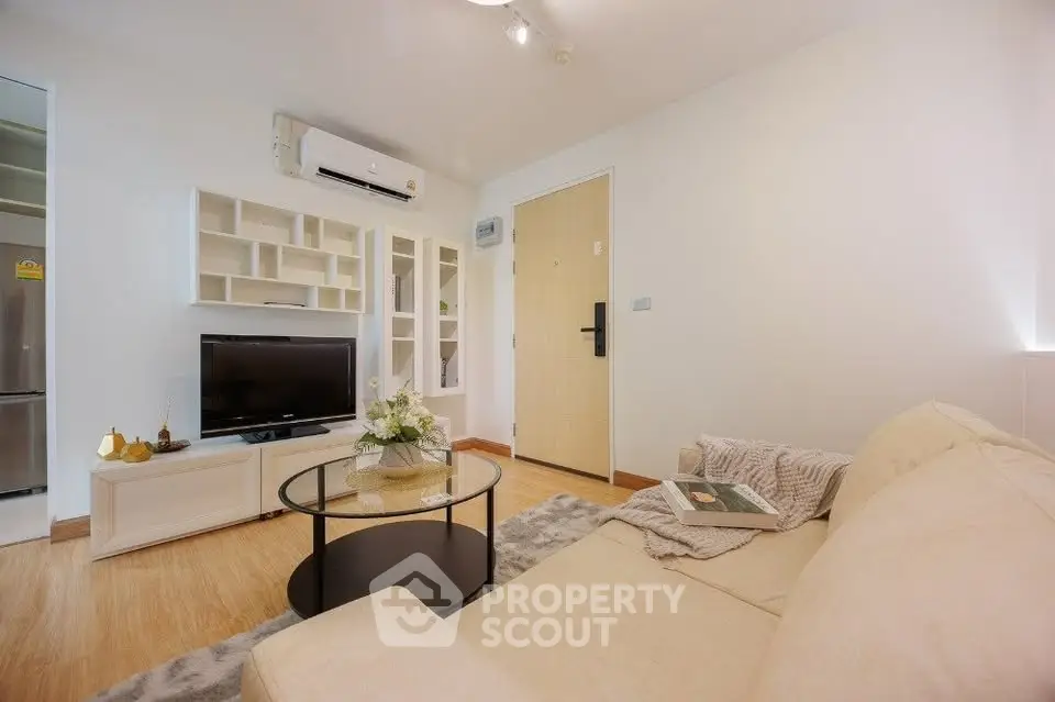 Modern living room with cozy beige sofa and stylish decor