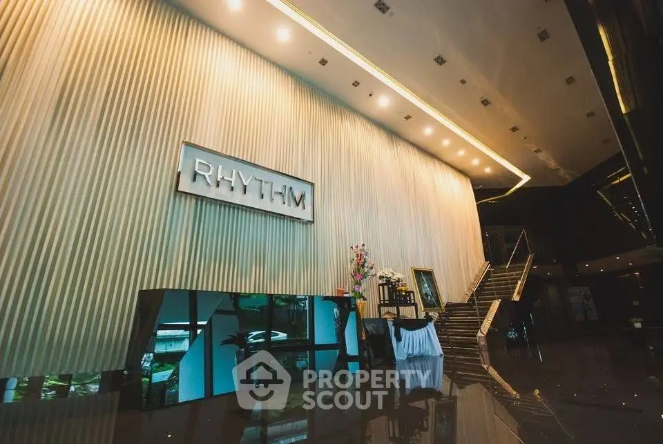 Luxurious building entrance with elegant decor and modern lighting