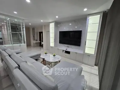 Luxurious modern living room with sleek design and large sectional sofa