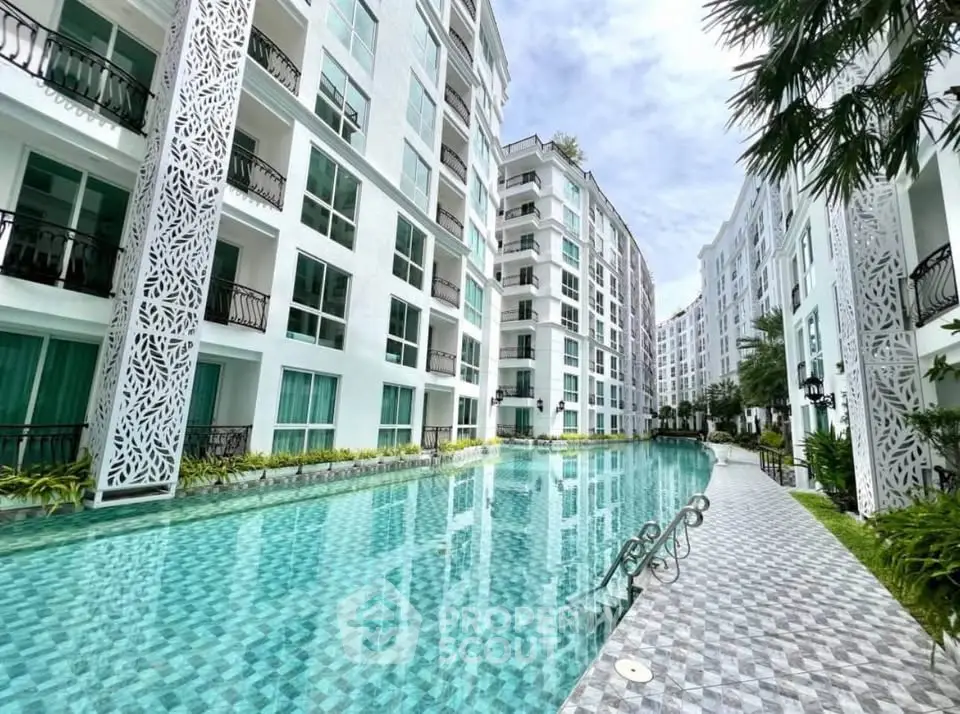 Luxurious condominium with stunning pool and modern architecture