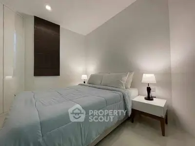 Modern bedroom with cozy lighting and minimalist decor