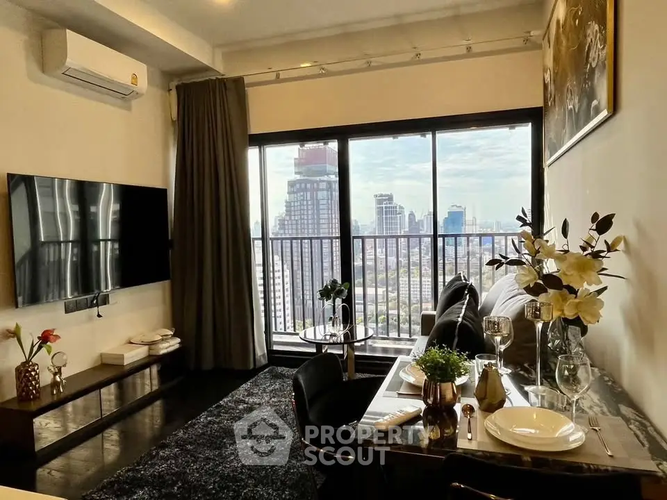 Modern living room with city view, stylish decor, and dining area in high-rise apartment.