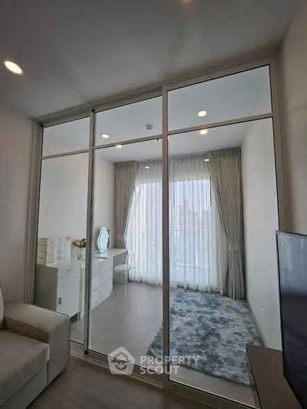 Modern interior with glass partition and elegant decor