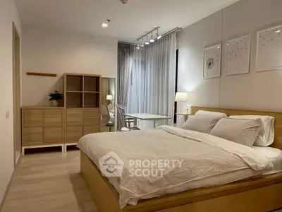 Modern bedroom with cozy wooden furniture and soft lighting