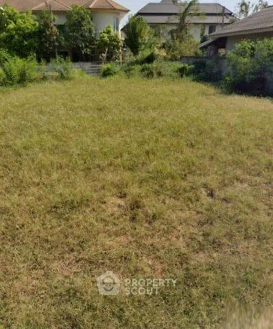 Spacious vacant land plot in a serene residential neighborhood, ideal for building a dream home.