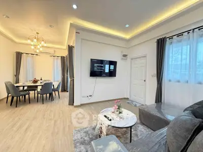 Modern living room with elegant dining area and stylish decor