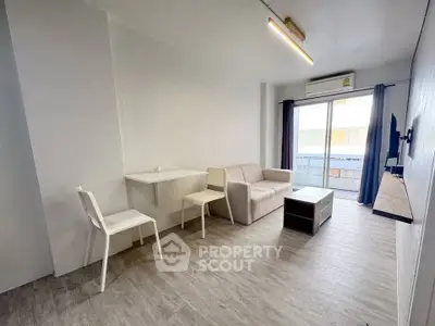 Modern minimalist living room with sleek furniture and natural light