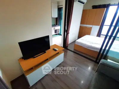 Modern studio apartment with sleek design and natural light