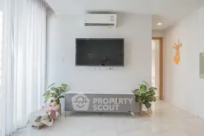 Modern living room with sleek TV setup and stylish decor