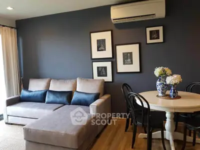Stylish living room with modern sofa and elegant dining area